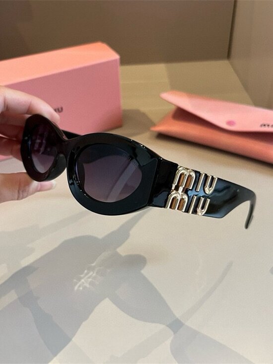 Miu Miu black sunglasses